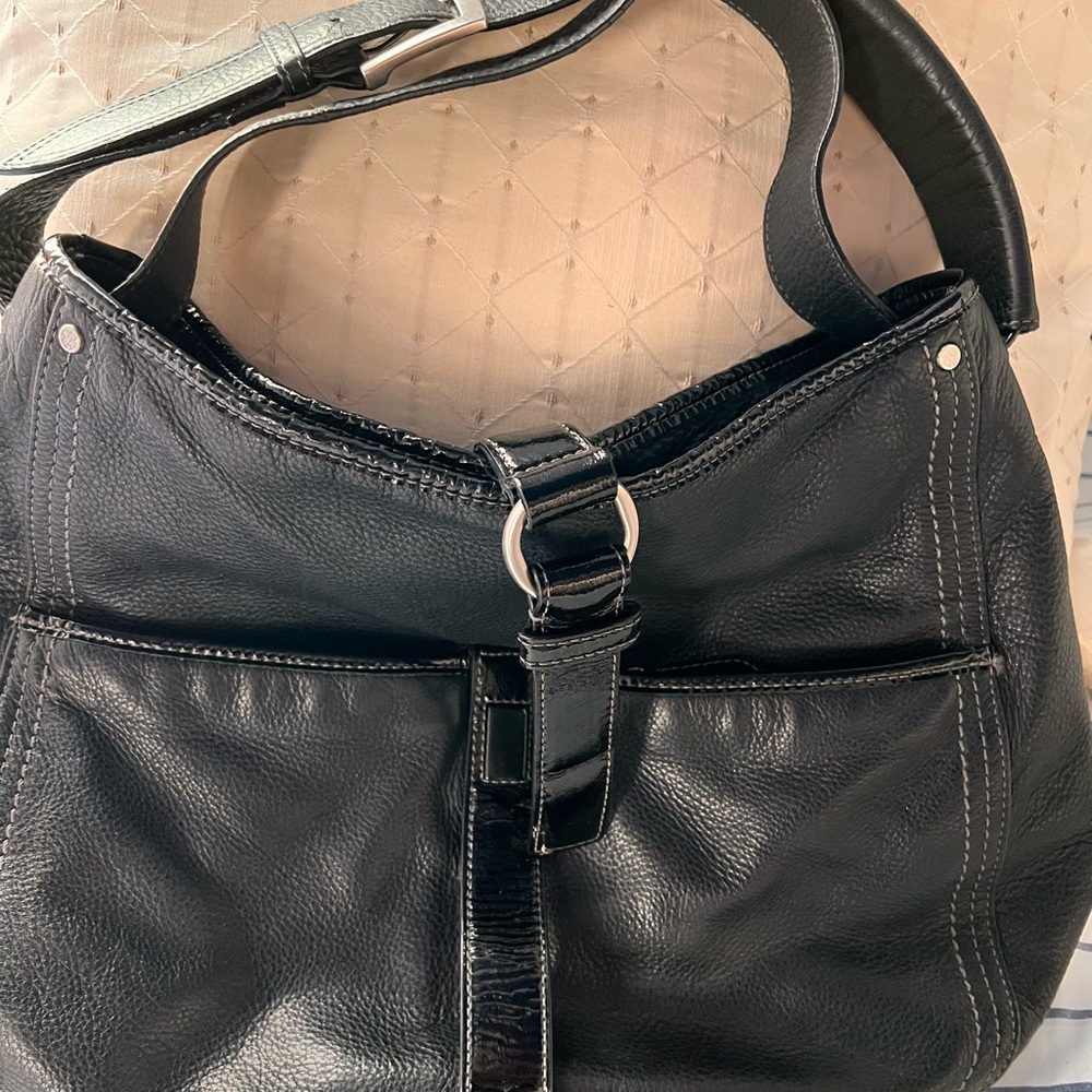 Black Cole Haan leather shoulder bag w/ patent leather trim & silver buckle